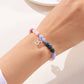 ✨Armband med 12 stjärntecken och pärlor och berlock med astrologiska tecken
